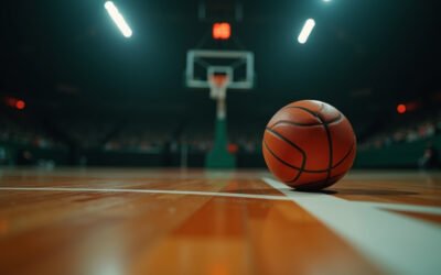 Cinematic wide-angle shot of a basketball in mid-air during an intense NCAA Tournament game, representing the excitement and drama of March Madness.